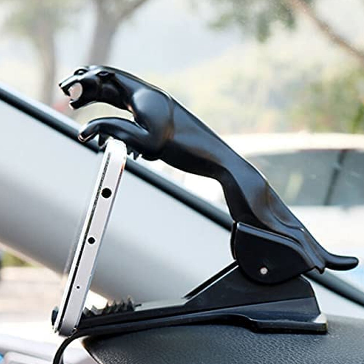 Mobile phone holder with a stylish jaguar design Mobile phone holder with a stylish jaguar design